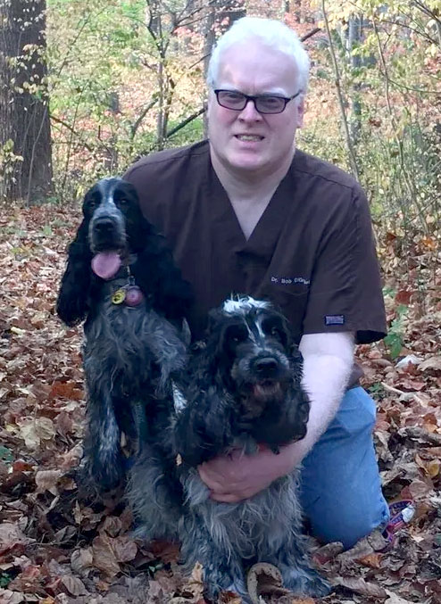 Veterinarian with dogs